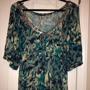Plus size floral top with sequin trim neckline